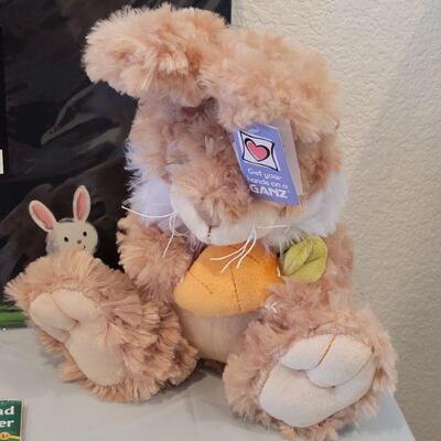 Lot 387: New Easter Basket with Ganz Bunny, Bath Toys, Spider-Man Bath Soap-Shampoo-Cleansing Gel, Pez, Activity Pad