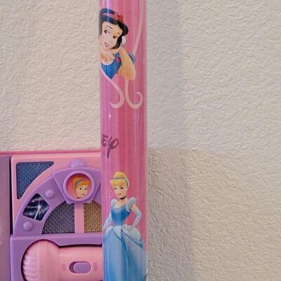 Lot 390: New Disney Princess Singing Book, Lip Gloss Rings, Erasable Tablet and Wrapping Paper 