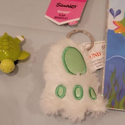 Lot 405: New Build a Bear Easter Basket with Chick and Bunny Slippers, Activities, Frog Slap Bracelet, Faux Rabbit's Foot and Card...