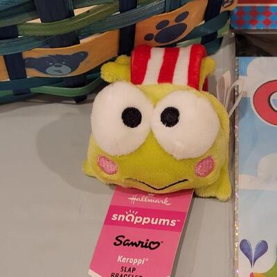 Lot 405: New Build a Bear Easter Basket with Chick and Bunny Slippers, Activities, Frog Slap Bracelet, Faux Rabbit's Foot and Card...
