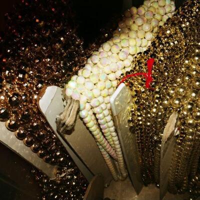 Box of Upholstery trim and bead yardage on bolts