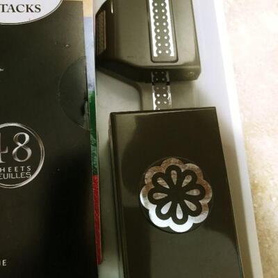 Stampin' Up Punches and 3 pads of 12x12 scrapbooking