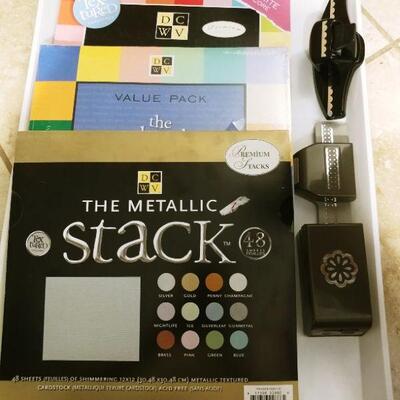 Stampin' Up Punches and 3 pads of 12x12 scrapbooking