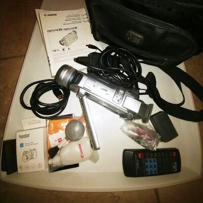 Canon Optura 20 video camera, leather case & Access.