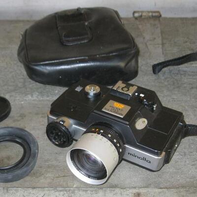 Lot 73 Vintage Minolta 110 Zoom SLR Camera + Autopak 460TX Instamatic Camera