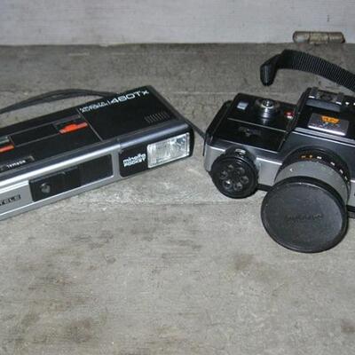 Lot 73 Vintage Minolta 110 Zoom SLR Camera + Autopak 460TX Instamatic Camera