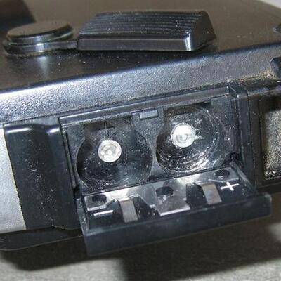 Lot 73 Vintage Minolta 110 Zoom SLR Camera + Autopak 460TX Instamatic Camera