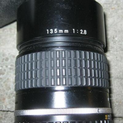 Lot 78 Nikon 35mm Camera EM + Extra Lens Series E1:28