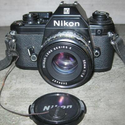 Lot 78 Nikon 35mm Camera EM + Extra Lens Series E1:28