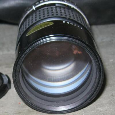 Lot 78 Nikon 35mm Camera EM + Extra Lens Series E1:28