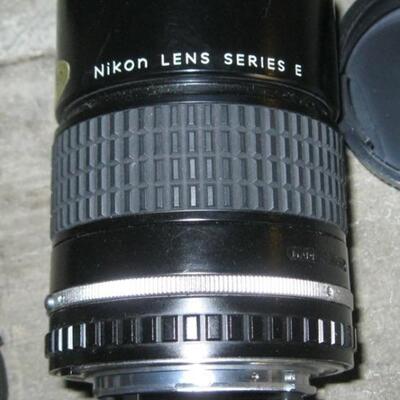 Lot 78 Nikon 35mm Camera EM + Extra Lens Series E1:28
