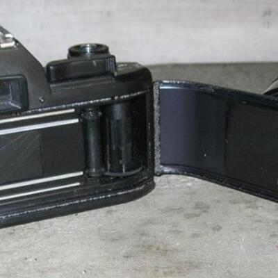Lot 78 Nikon 35mm Camera EM + Extra Lens Series E1:28
