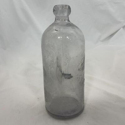 -10- VINTAGE | Ishpeming, MI | K A Ruona & Co | Blob-Top Clear Glass Bottle