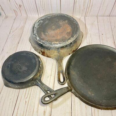 Lot 113 Cast Iron Cook Ware 3 pieces Skillets & Griddle