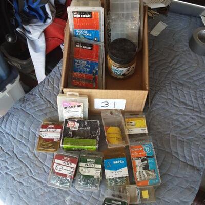 Nails, wedge anchors, cotter pins, drywall anchors, variety of screws, etc. as shown