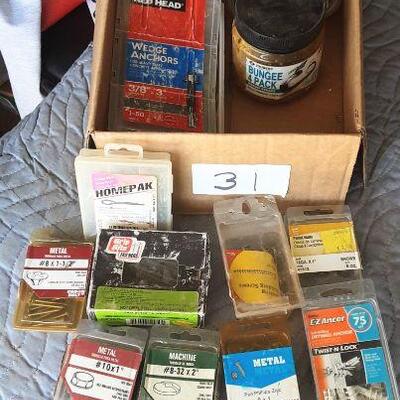 Nails, wedge anchors, cotter pins, drywall anchors, variety of screws, etc. as shown