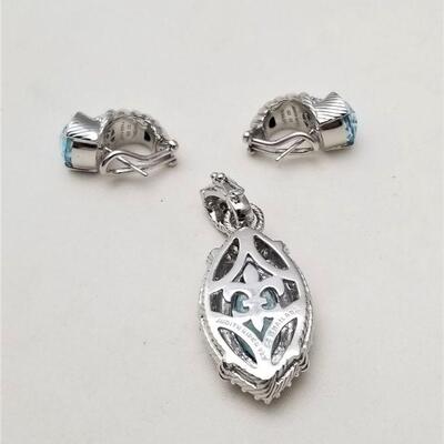 Lot #111  Stunning Sterling Silver/Blue Topaz Enhancer with Matching Pierced earrings