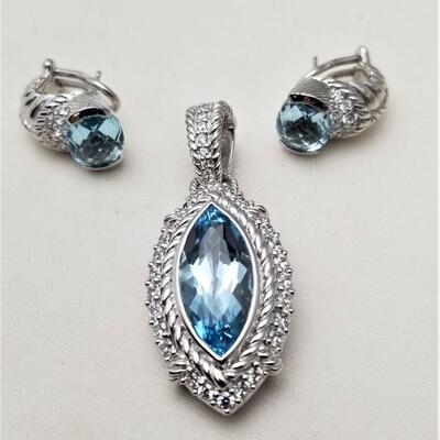 Lot #111  Stunning Sterling Silver/Blue Topaz Enhancer with Matching Pierced earrings