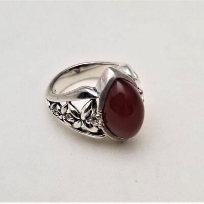 Lot #116  Sterling Silver Ring w/amber colored cabochon