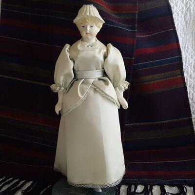 Vintage Porcelain Hatted Doll