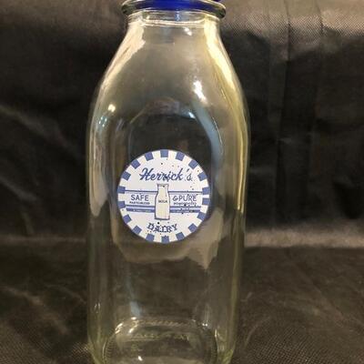 3 pitchers and a milk bottle