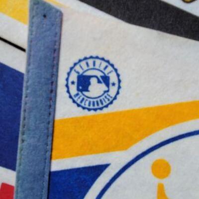 Lot 1: Pennants â€“ Royals, Pirates, and Dodgers 