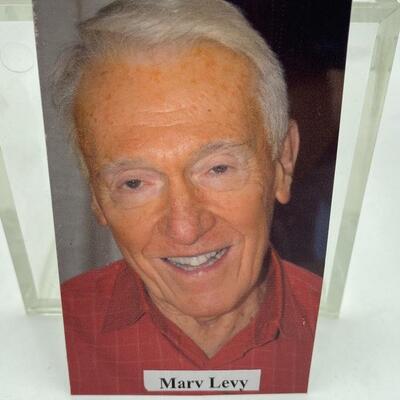 Autographed Marc Levy Football Photo.