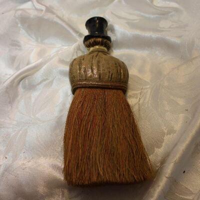 Creepy Dickens style figural crumb whisk broom