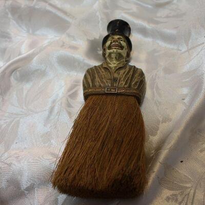 Creepy Dickens style figural crumb whisk broom