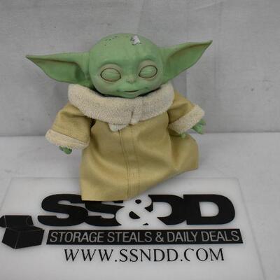 Electronic Yoda Toy. Opens eyes, moves arms, etc - Works