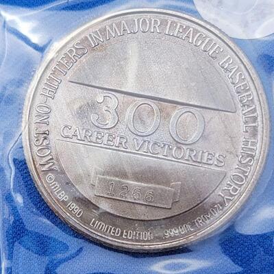 Lot 69: 1 oz. Silver Coin â€“ 1990 300th Victory Nolan Ryan