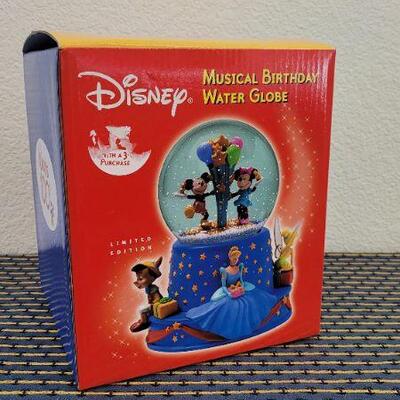 Lot 30: New Old Stock Disney Water Globe