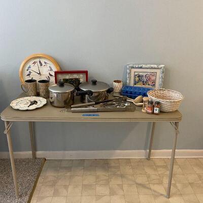 Lot 18 - 4 foot table with contents 