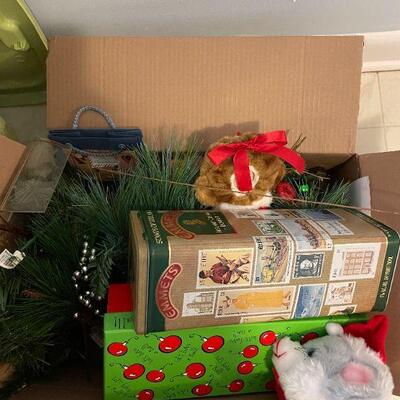 Lot 21 - (2) Boxes full of festive Christmas, Halloween Decorations, and fabrics 