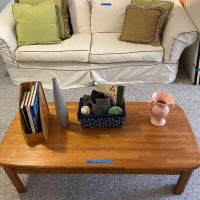 Lot 23 - Solid wood coffee table with contents
