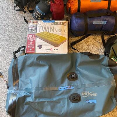 Lot 31 - Large Bass pro shops duffel bag, Swiss gear solo twin air bed inflatable, sea line 30 gallon dry bag, (2) backpack pillows, more...