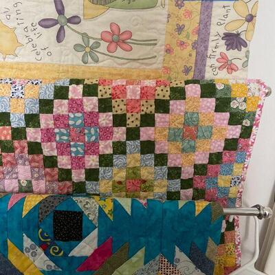 Lot 38 - 7 handmade quilts, table cloths, misc. blankets