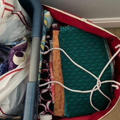 Lot 41 - Misc. bags, lots of fabrics, laundry basket