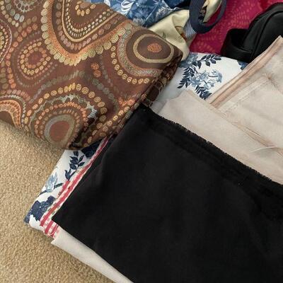 Lot 41 - Misc. bags, lots of fabrics, laundry basket