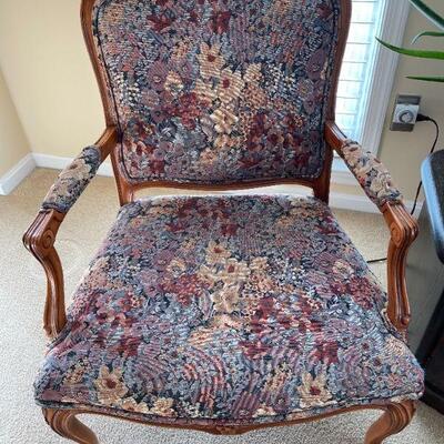 Lot 44 - Lot 44 - 2 solid wood upholstered chairs, double door wooden table, lamp, (2) Bradford plates, live aloe plant, faux plant