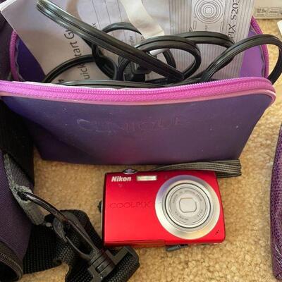 Lot 45 - Silverware box only, door pillow, lot of cameras