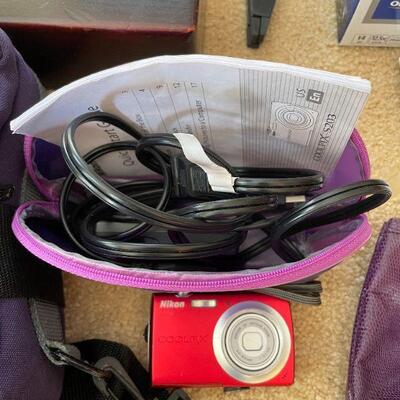 Lot 45 - Silverware box only, door pillow, lot of cameras