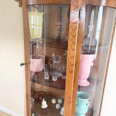 Lot 49 - Solid wood showcase with contents