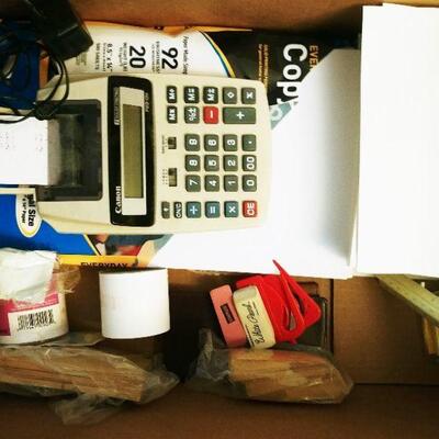 Box of office paper, envelopes, adding machine