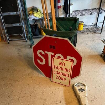 Lot 54 - Green standing bag, vintage stop sign, vintage no parking sign, vintage parking meter, crutches, (2) ski poles, BB gun