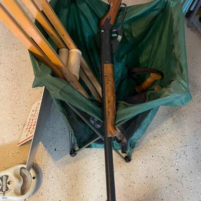 Lot 54 - Green standing bag, vintage stop sign, vintage no parking sign, vintage parking meter, crutches, (2) ski poles, BB gun