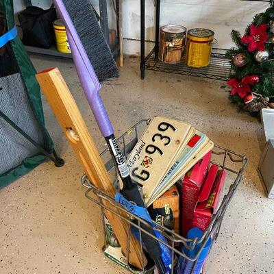 Lot 55 -  (6) vintage license plates, metal basket, level, misc. sprays and supplies