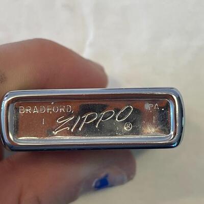 Lot 72 - 2 vintage Zippo lighters in original boxes, vintage â€œpenguinâ€ lighter, vintage Zippo lighter
