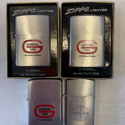 Lot 72 - 2 vintage Zippo lighters in original boxes, vintage â€œpenguinâ€ lighter, vintage Zippo lighter