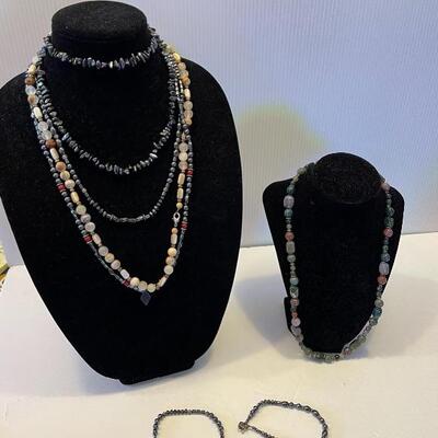 Lot 74 - (3) hematite necklaces, one pair of hematite earrings, (2) hematite bracelets, (2) natural stone necklaces, one natural stone...